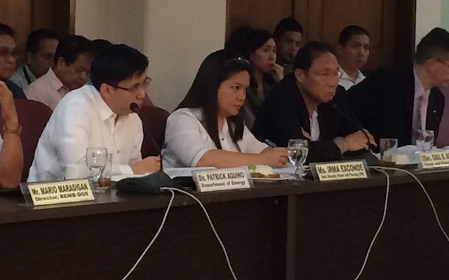 BACKTRACK. Department of Energy representatives face members of the House committee on energy. Photo by Rappler