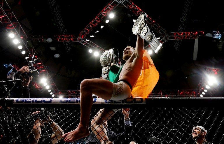 McGregor knocks out Alvarez, becomes first to hold two UFC titles at same time