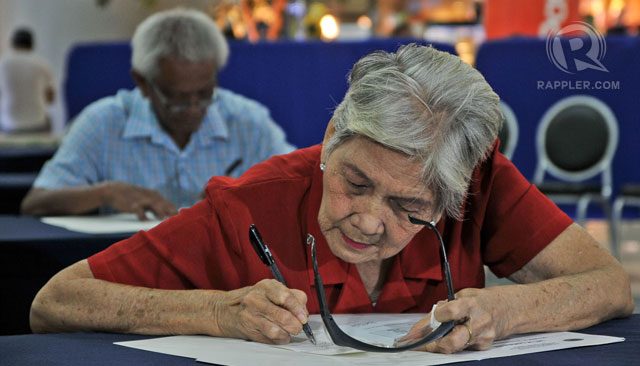 Aquino signs law giving health insurance to all seniors