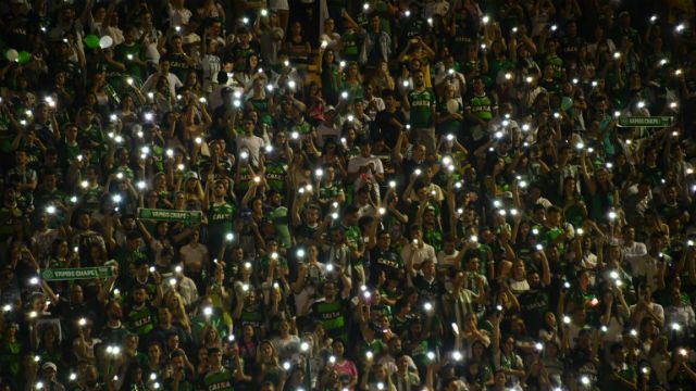 Fans cram into Brazil football stadium to mourn dead players