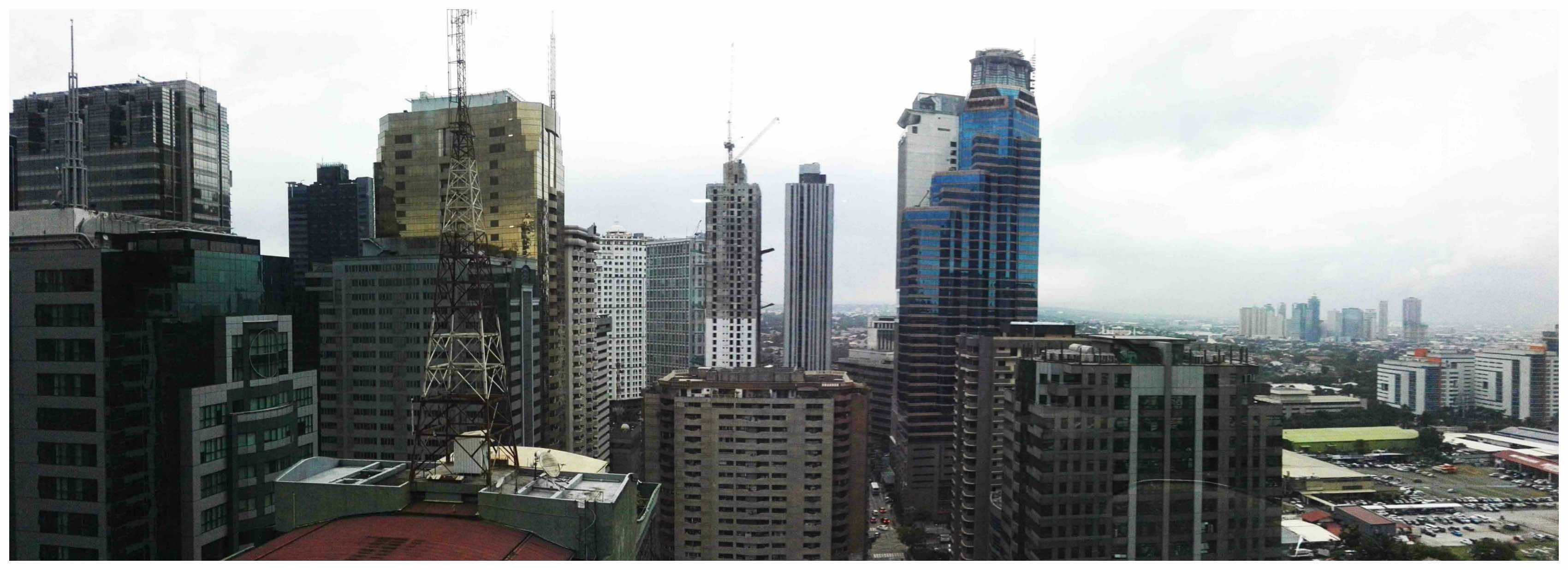 HIGH RISE. Part of the Ortigas skyline taken using Panorama mode with no filter. 
