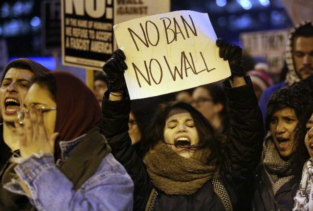 TRUMP'S BAN. Demonstrators stage a protest in Chicago, Illinois, on February 1, 2017, against US President Donald Trump's immigration and travel ban. Photo by Joshua Lott/AFP 