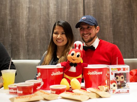 FIRST CUSTOMERS OF THE DAY. Callan and Faye Javier of Coney Island, Brooklyn enjoying their first and well-deserved Jollibee Manhattan meal after a 20-hour wait. Photo courtesy of Jollibee Philippines 