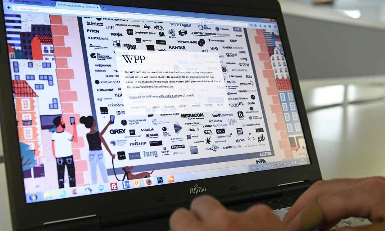 SERANGAN PETYA. Situs kantor iklan di Inggris, WPP, usai terkena serangan siber Petya. Foto oleh Benjamin Fathers/AFP 