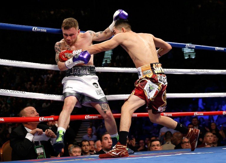 REVENGE. Leo Santa Cruz avenged his loss to Carl Frampton last year, inflicting the first defeat on the Irishman's record. Photo by Steve Marcus/Getty Images/AFP 