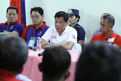 MEETING. President Rodrigo Duterte meets with labor groups during a Labor Day celebration in Davao City in May 2017. Malacañang file photo 