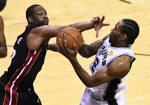 Spurs easily cruise past Heat in Finals rematch