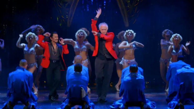 THE ENGINEERS. Jonathan Pryce shows he still can dance alongside Jonjon Briones. Screengrab from YouTube