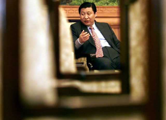 FUJIAN GOVERNOR. Xi Jinping, then-governor of China's coastal Fujian province, responds to a journalist's question on February 23, 2000, during an interview at the central government building in Fuzhou. Photo by Stephen Shaver/AFP 