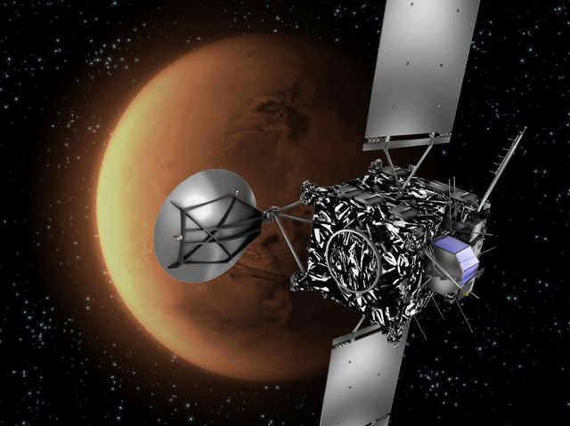 ROSETTA. A file handout picture released by the (ESA) shows an artist's impression of the ESA probe Rosetta with Mars in the background. C.Carreau/AFP Photo/ESA