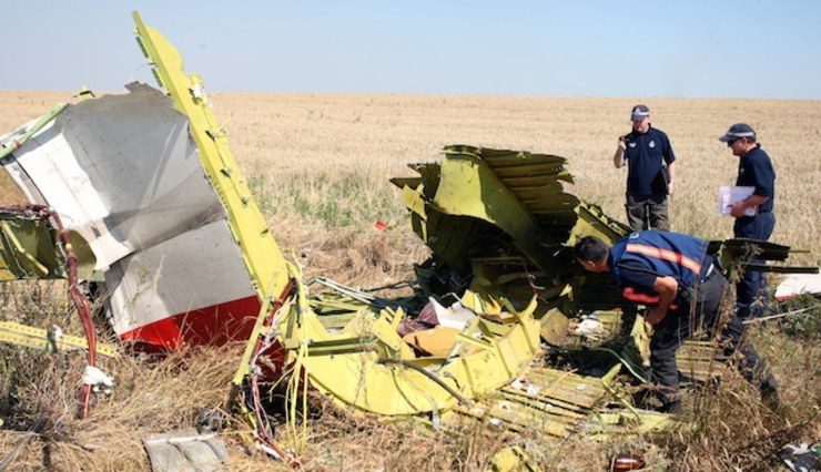 Civilian toll mounts in Ukraine fighting as MH17 probe goes on