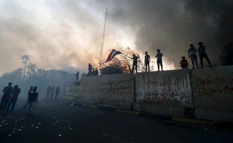 Iraq parliament holds emergency talks as Basra burns