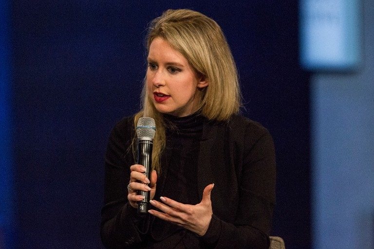 Former Theranos biotech star indicted on fraud charges