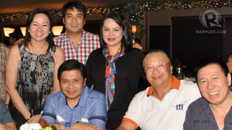 NAPOLES WITH SOLONS. Janet Lim-Napoles, left (standing), rubs elbows with senators Jinggoy Estrada and Bong Revilla in this photo taken during a party in Estrada's favorite hangout in San Juan. The man second from right is businessman Jaime Dichaves, who has owned to the Jose Velarde account initially linked to former President Joseph Estrada.
