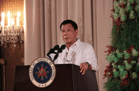 HONOR. President Duterte speaks at the PAFIOO awarding ceremony. Photo courtesy of the Commission on Filipino Overseas 