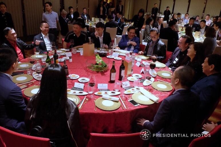 POWER. Michael Yan is seated beside Bong Go. President Duterte and Honeylet Avanceña are also there. File photo by Malacañang  