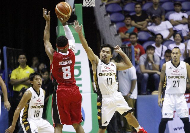 DEFENSE. Manny Pacquiao attempts to close out on Calvin Abueva as he shoots a triple. Photo from PBA Images 