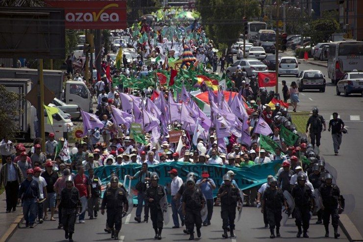 #COP20: Thousands in Lima march for climate as talks grind on