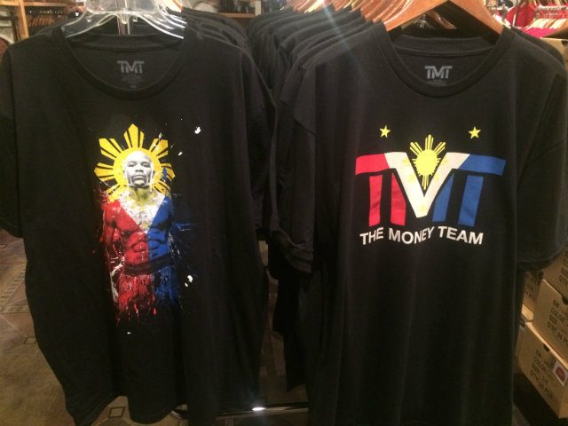 Mayweather takes a not-too-subtle shot at the Filipino boxer with his new line of apparel. The one on the left costs $45 while the one on the right goes for $38. Photo by Ryan Songalia  