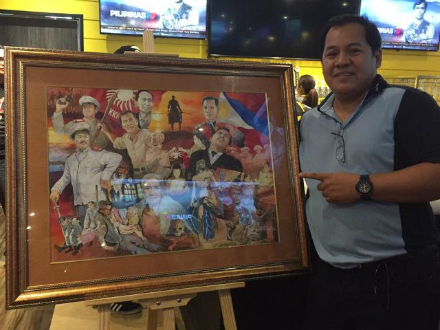 Artist Jun Aquino with his painting 'Dakilang Lahi,' a portrait of the Philippines' founding fathers he describes as 'the Philippines' X-Men of the 1890s,' at the Pilipinas HD launch. Photo by Ryan Songalia/Rappler   