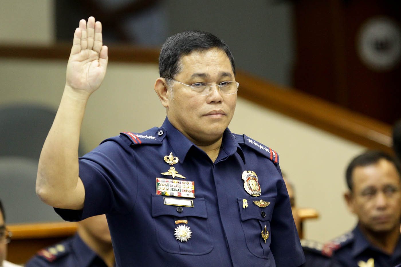 Poe tells embattled PNP chief: Let go