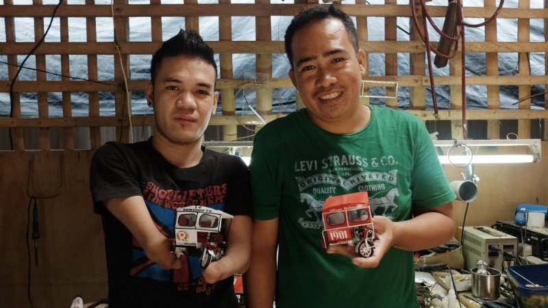 EMPLOYED. Andy Villaruel poses with his employer, Julius Lusaya, with their finished products  
