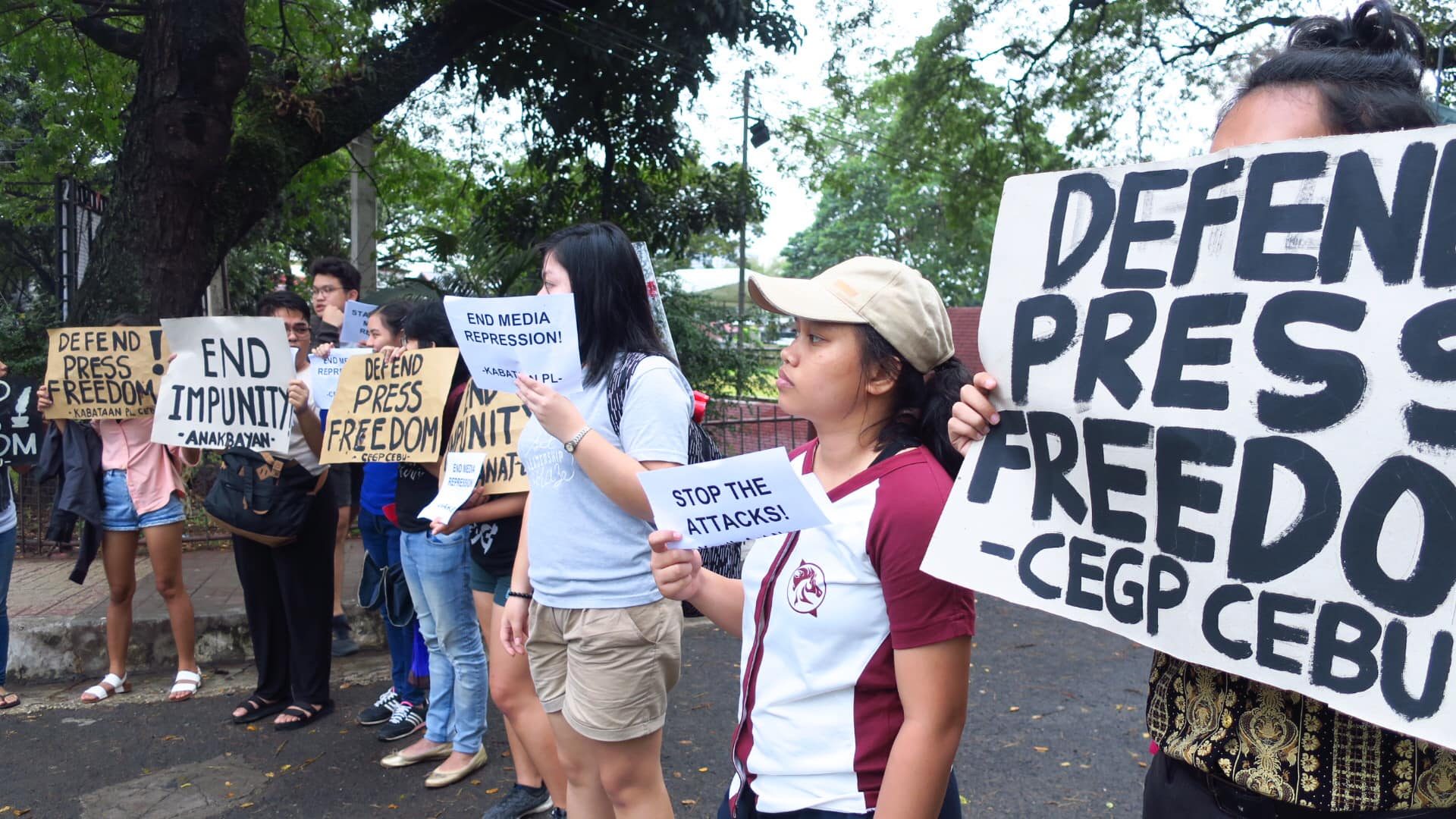 DEFEND PRESS FREEDOM. CEGP Cebu holds a protest action at the UP Cebu entrance gate to express that the arrest of a journalist is a 'clear violation of the right to information and free press' on February 14, 2019. Photo from CEGP Cebu  