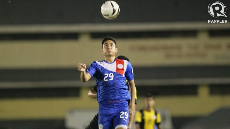 The Philippines' Patrick Reichelt (9) goes up for a header. Photo by Mark Cristino