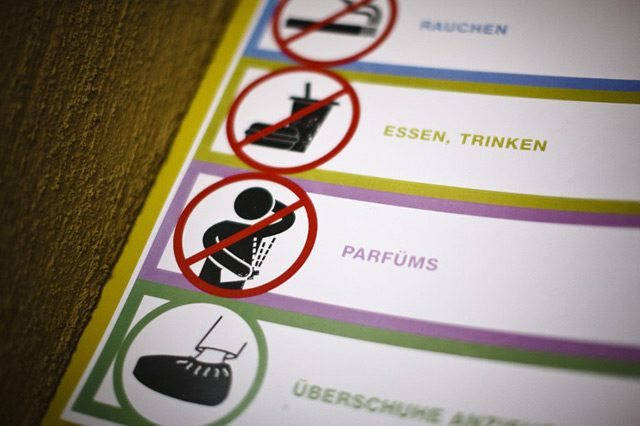 BANNED. A prohibition sign shows the ban of parfum in the apartment building. Photo by Michael Buholzer/AFP