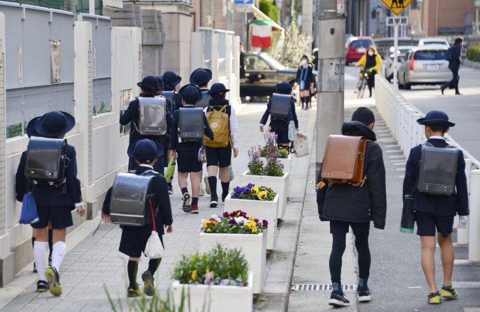 EARLY BREAK. File photo of pupils in Japan. Photo by Kyodo News  