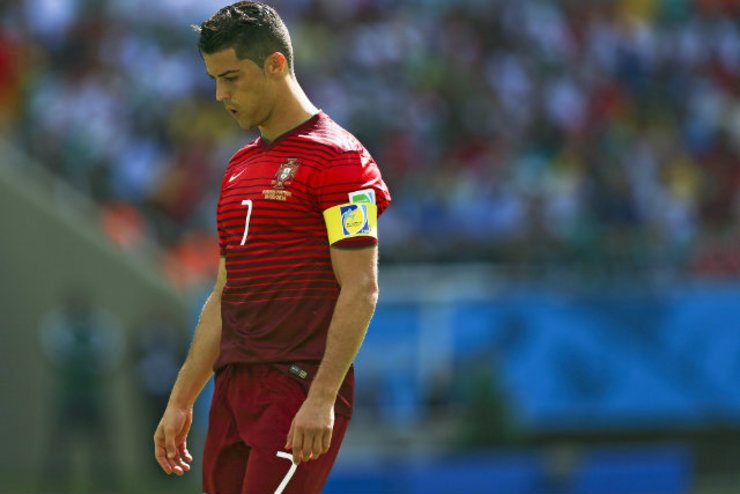 A dejected Cristiano Ronaldo leaves the pitch after his side was taken apart by Germany. Photo by Jose Sena Goulao/EPA