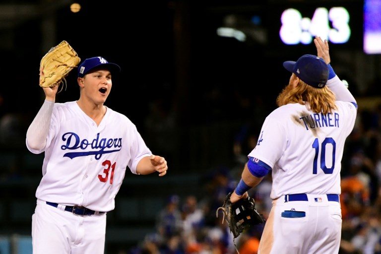 Dodgers down Astros to keep World Series bid alive