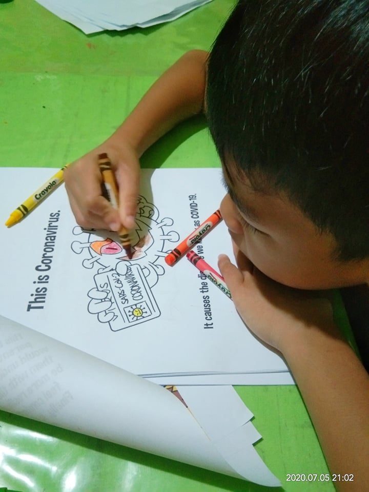 A CHILD'S ARTISTRY. Seven-year-old Pett Gregory Larroder, Dr Larroder's nephew, uses vibrant colors to color in this illustration of coronavirus. Photo courtesy of Jean Suobiron-Larroder 