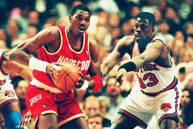 GREAT BIGS. Hakeem Olajuwon vs. Patrick Ewing was one of the NBA's greatest rivalries. Photo by BOB STRONG / AFP 