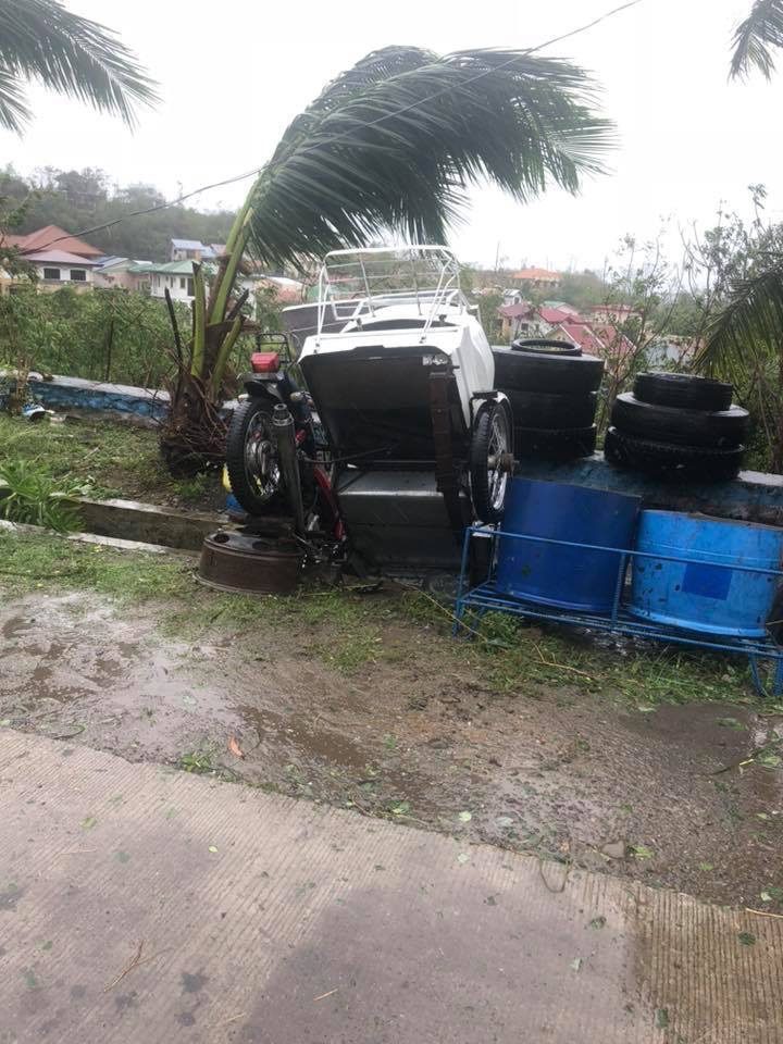 UPSIDE DOWN. A tricycle in Ilagan City was no match for Typhoon Rosita. Photo by Fr Grevie Uanan 