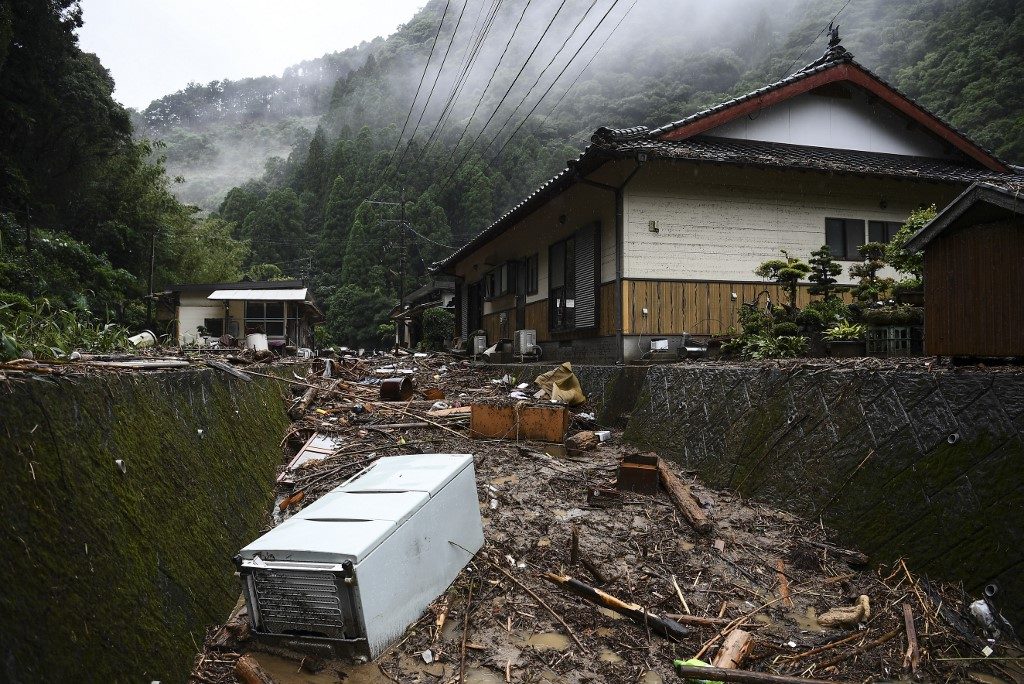 WRECKAGE. Debris are seen at a residential area hit by torrential rain, in Ashikita, Kumamoto prefecture on July 7, 2020. Photo by Charly Triballeau/AFP 