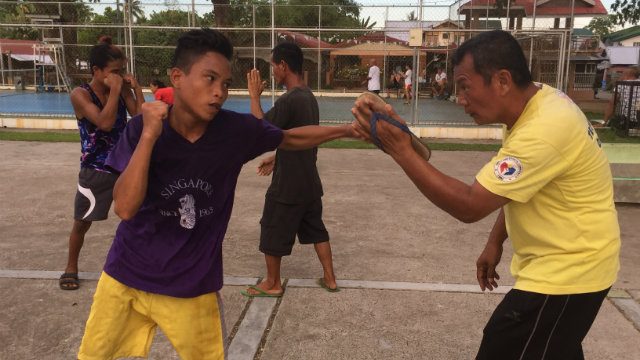 Sparring with sandals: A boxing trainer fights for support in Leyte