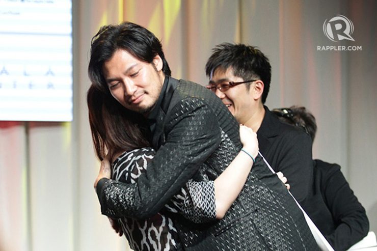BIG HUG. Munetaka Aoki holds a lucky fan. Photo by Mark Cristino/Rappler 