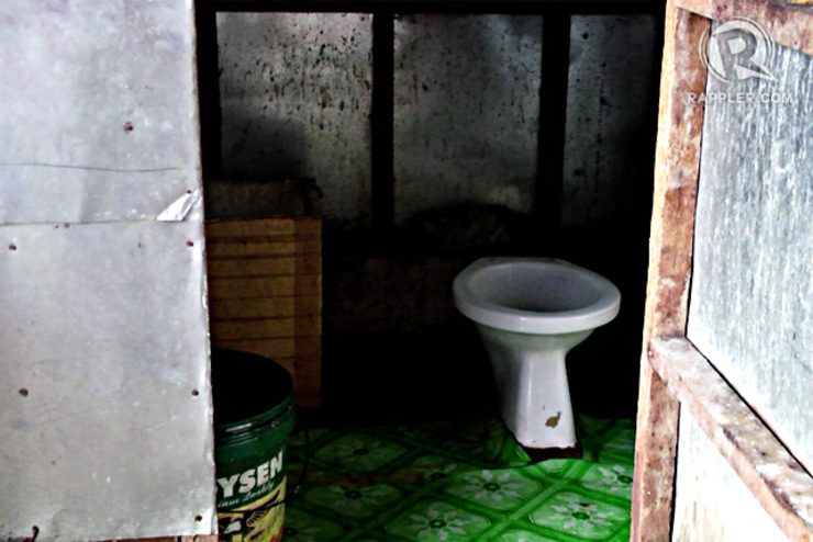COMMON BATHROOM. In a bunkhouse community in Palo, Leyte, up to 270 families share common bathrooms like this. Photo by Franz Lopez/Rappler