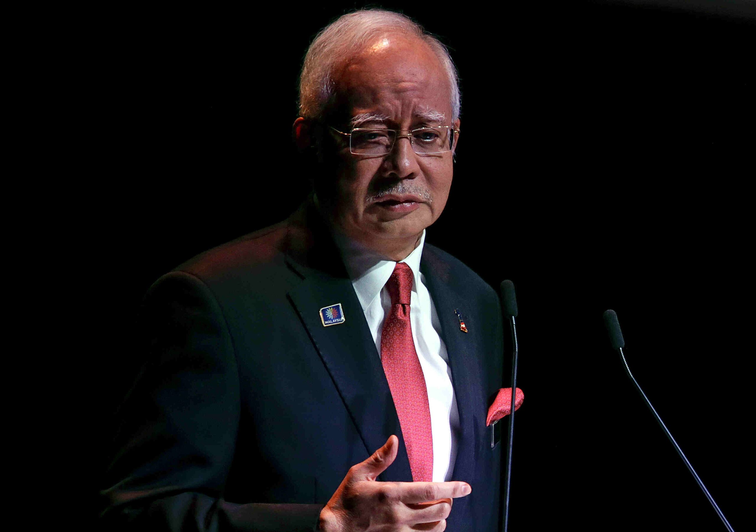 Malaysia pledges to help Swiss probe as pressure on PM grows