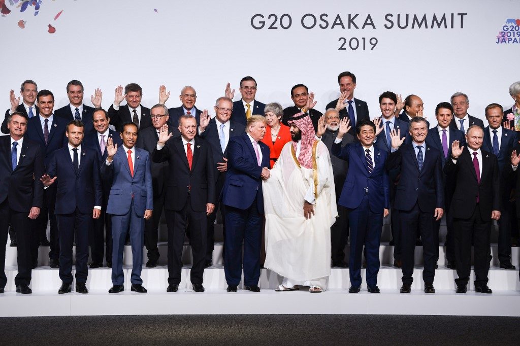 ‘Beautiful harmony’: Trump plays nice as divisive G20 opens