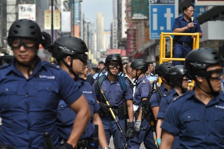 HK police reopen main road after clearing protest camp