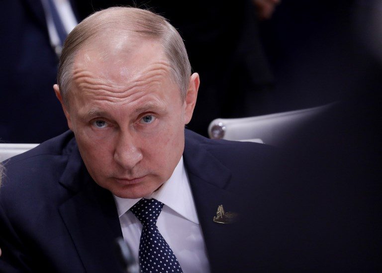 U.S. threatens new sanctions as Russia laughs off Putin list