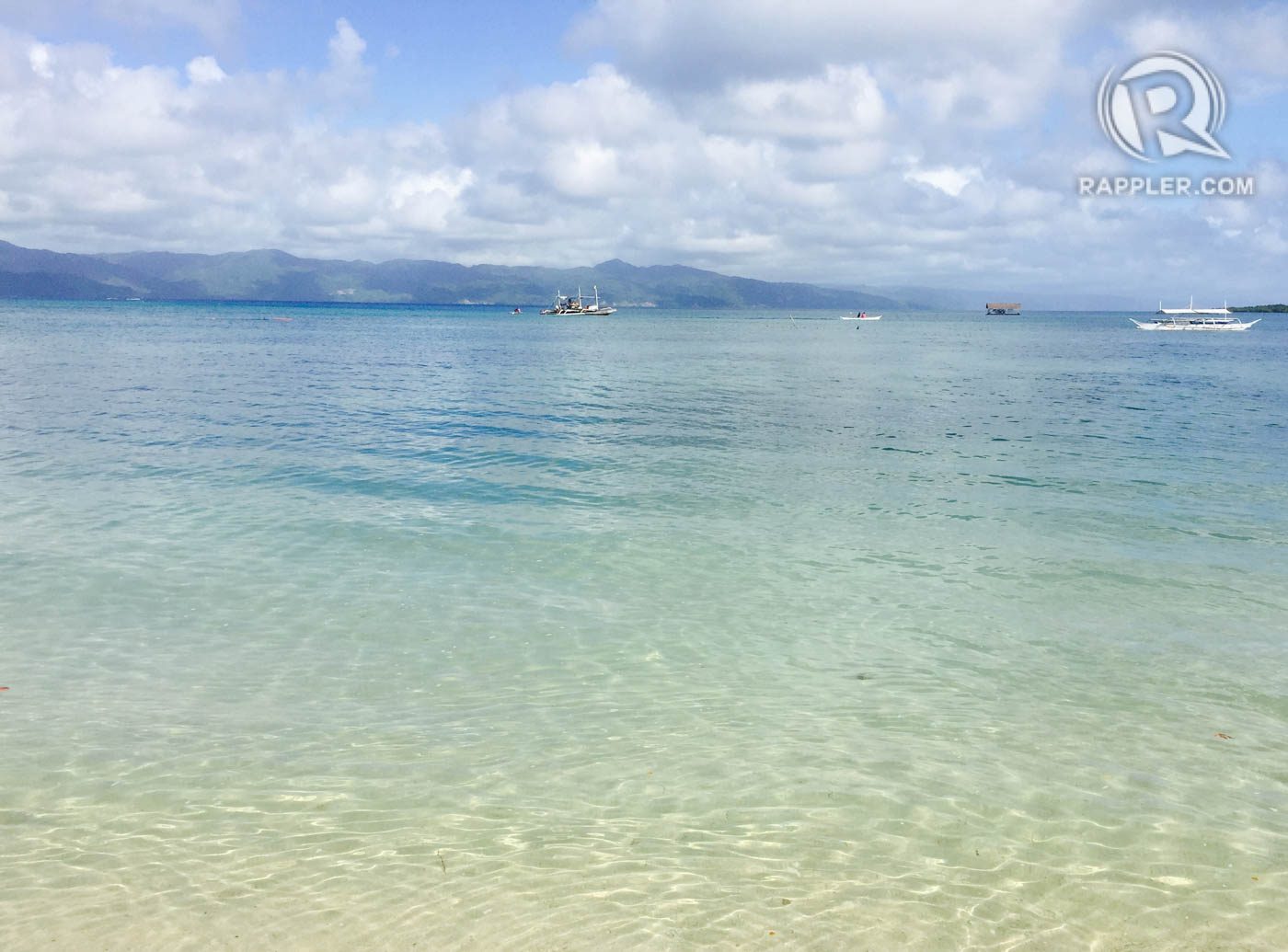 CRYSTAL CLEAR. The island's pristine waters. Photo by Bonz Magsambol/Rappler    