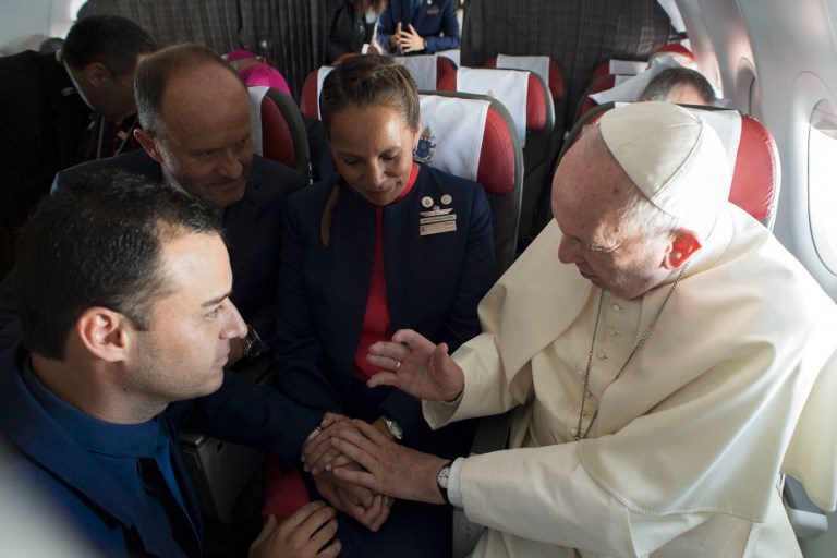 Pope marries couple on papal plane