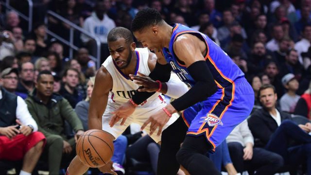 OUT OF ACTION. A collision between Chris Paul (L) and Russell Westbrook (R) injures the Clippers' point guard. Photo by Harry How/Getty Images North America/AFP 