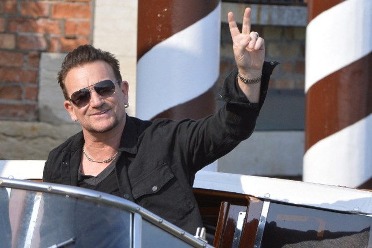 Bono says may never play guitar again after bike fall