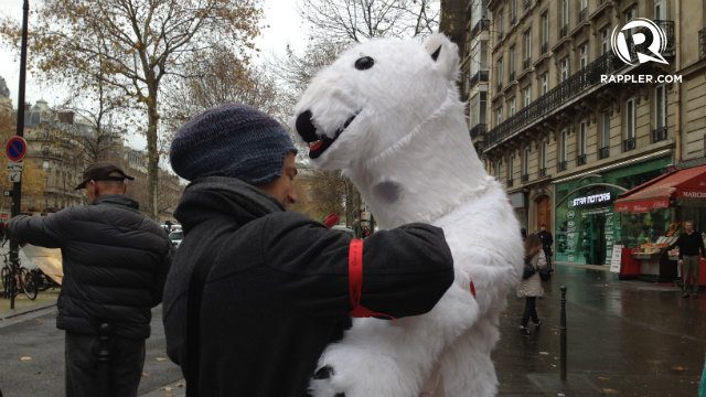IN PHOTOS: Paris streets festive, call for climate justice