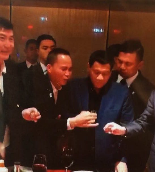 FUN. In this photo presented by Acierto, President Duterte is seen having fun with Michael Yang and other Chinese nationals. 