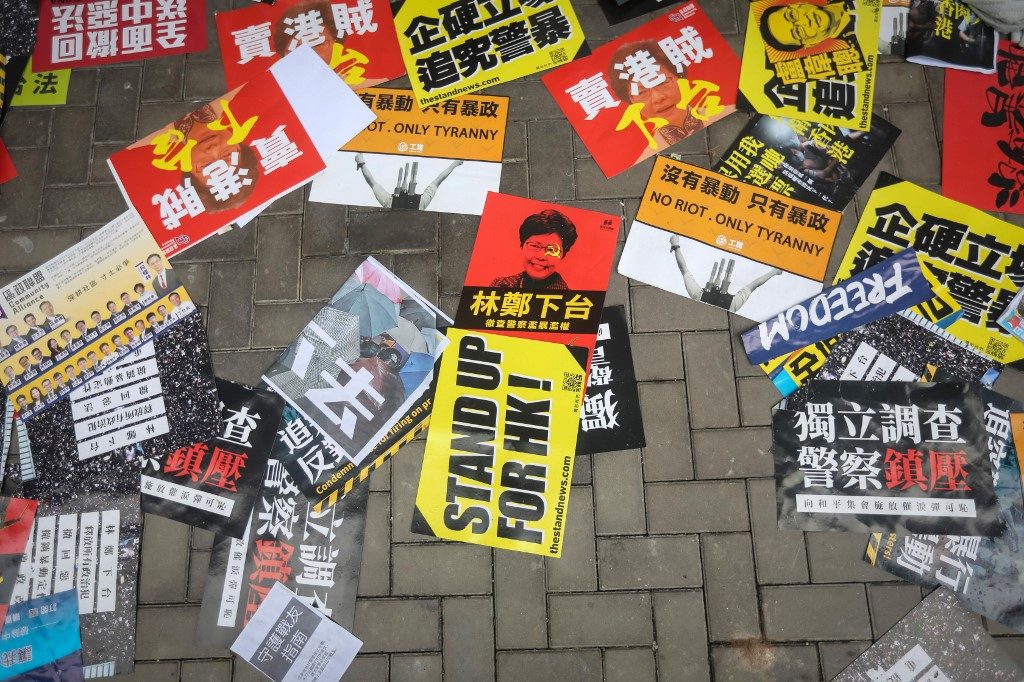 Hong Kong grapples with protest aftermath; China demands criminal probe